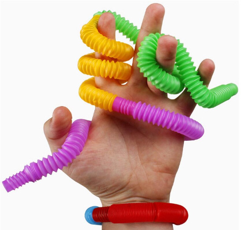 5 pezzi di plastica colorata Pop Tube Coil creativo magico giocattolo cerchio giocattoli divertenti sviluppo precoce educativo giocattolo pieghevole