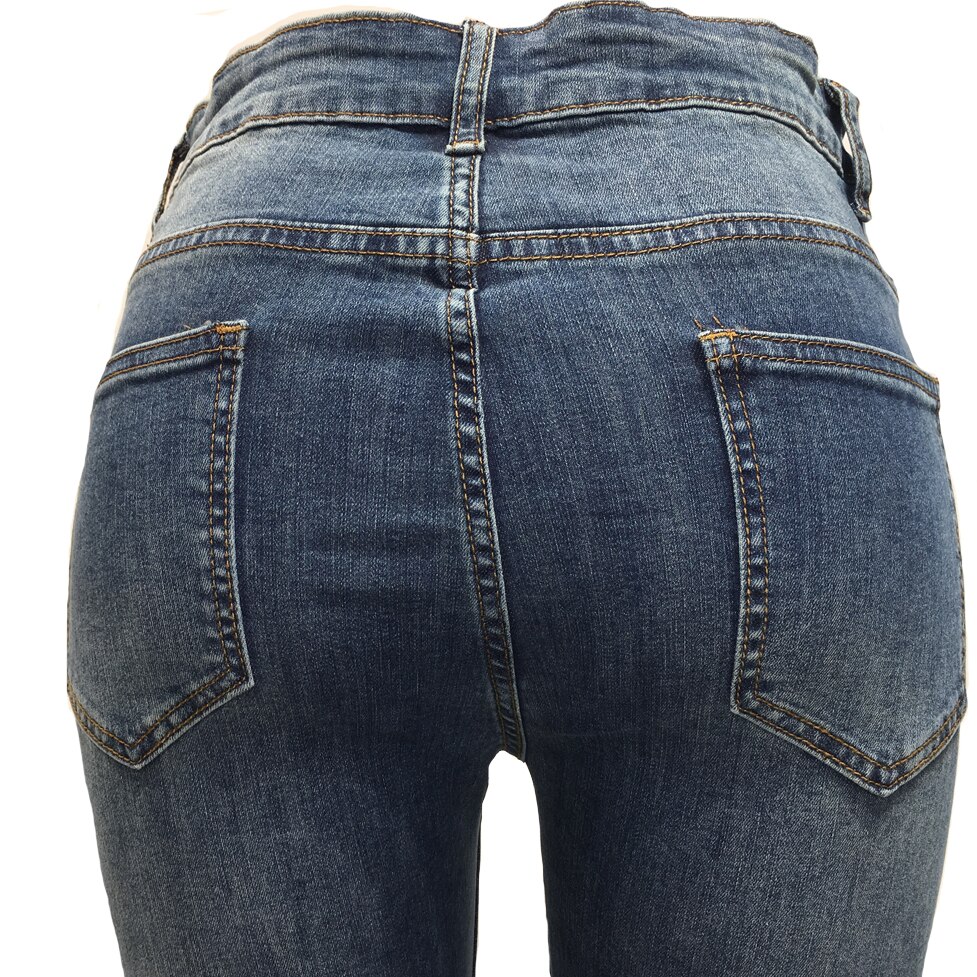 sprühen auf Männer der Jeans Zerrissene Hosen Super schlank Fitnessraum Sport strecken Denim Hosen Elastische Europäischen Jeansy