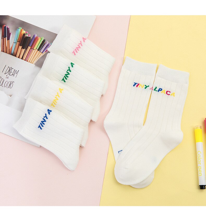 1 paio da 1 a 8 anni lettere colorate calzini lunghi per ragazzi ragazze calzini bianchi per studenti uniforme scolastica calzini di cotone autunnali bambini