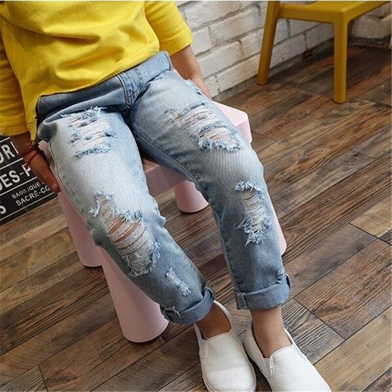 Moda bambini Jeans strappati Jeans pantaloni Jeans per ragazze pantaloni in Denim per ragazzi Jeans per bambini pantaloni in Denim rotto per bambini vestiti per bambini