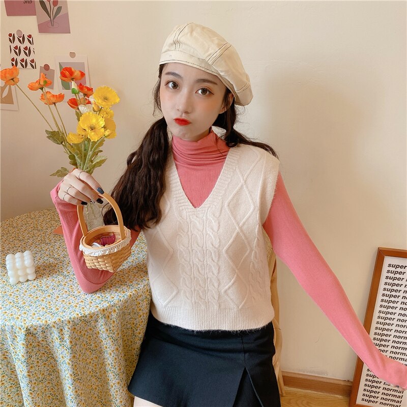 Mjuk tröja väst dam höst koreansk stil söt argyle v-ringad ärmlös tröja kort stickad linne tröja  t537: Beige