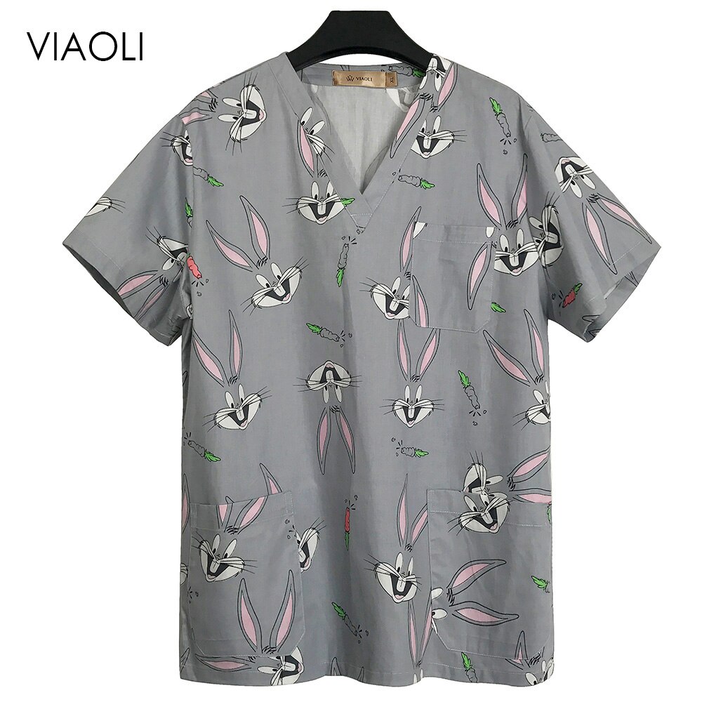 Kvinnliga vårdpersonal arbetskläder unisex vårduniform kvinnor scrubs tops uniformer kläder tecknat print scrub tops kostym