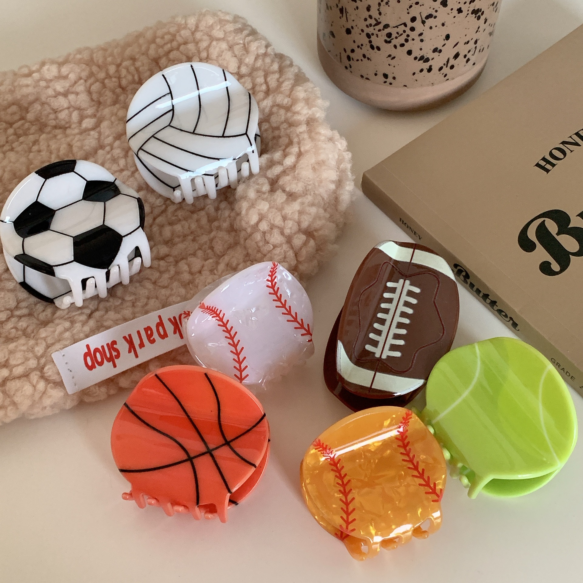 Deportes atléticos fútbol americano baloncesto béisbol pinzas en forma de garra mujeres niñas pelotas de fútbol accesorios para el cabello 2023