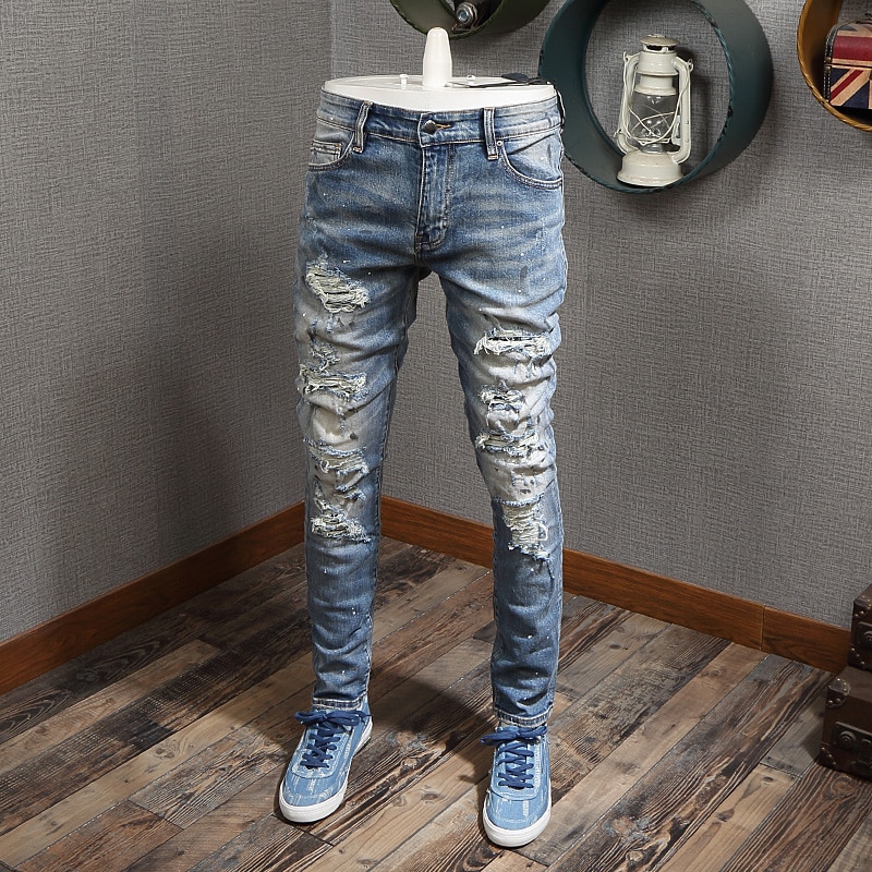 Nyligt high street mænd jeans lyseblå malede rippede jeans mænd ødelagde bukser patchwork hip hop jeans homme