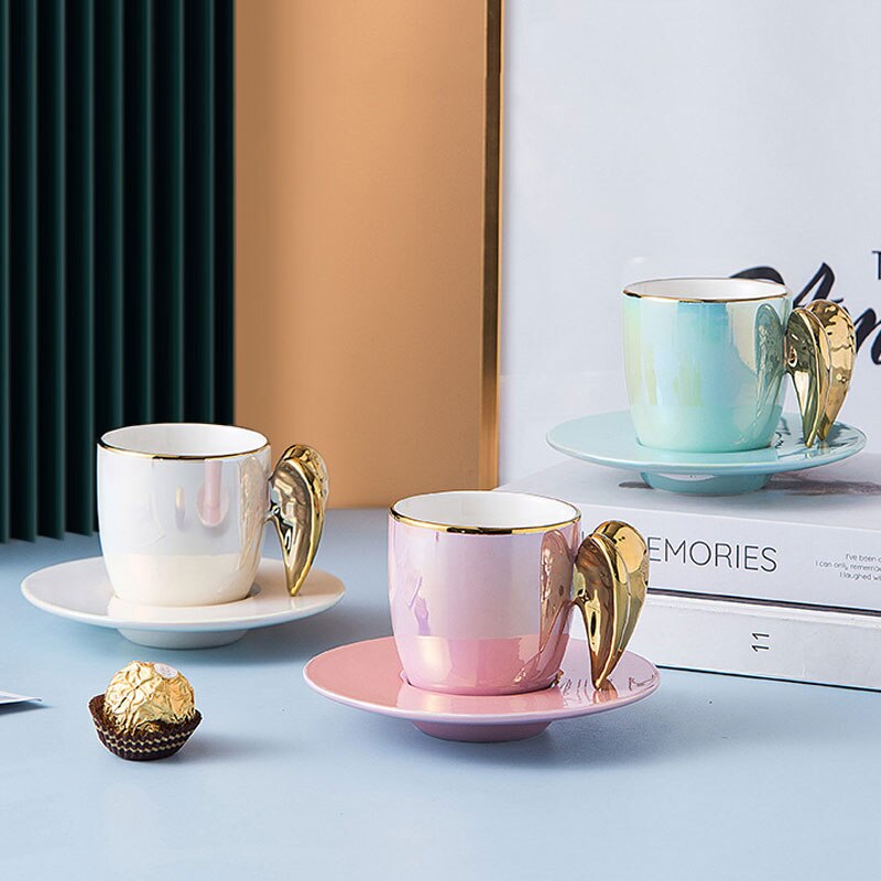 Nordycki kreatywny złoty anioł skrzydło kubek z talerzykiem porcelanowa filiżanka robić herbaty kawy zestaw uroczy prezent urodzinowy biała perła różowy niebieski kubek spodek