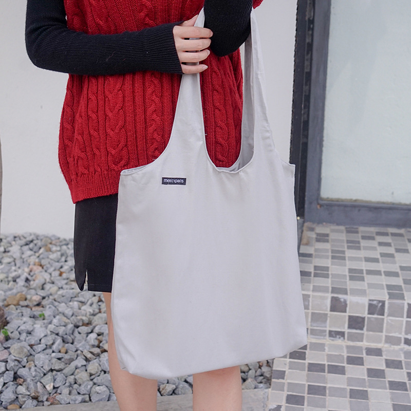 Eenvoudige grote capaciteit canvas tas vrouwen wit winkelen schoudertas handtas hand tassen casual handtas Raden