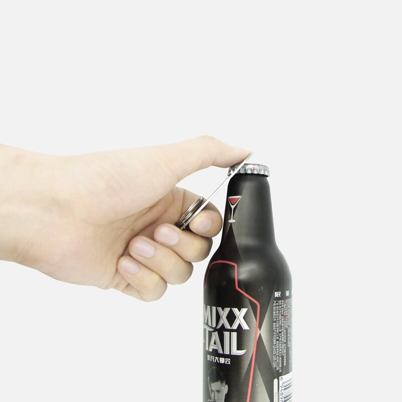 Ruostumattomasta teräksestä litteät pullonkorkin avaaja poistotangon terä kotihotelli olutpullonavaaja avaimenperät