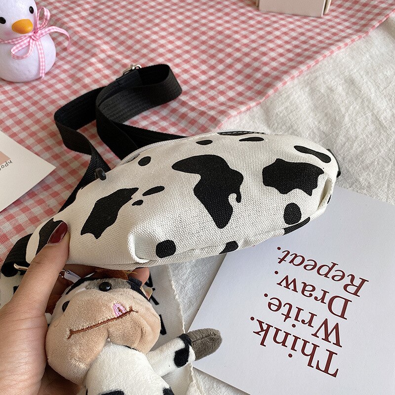 Moda coreia do sul vaca lona pequeno mensageiro zíper bolsa telefone peito crossbody sacos para as mulheres manchas tem porto de carregamento
