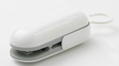 Przenośny plastikowy zgrzewarka robić użytku domowego mini zgrzewacz robić plastikowych torebek z małymi dłońmi zgrzewarka ciśnieniowa: Czerwony