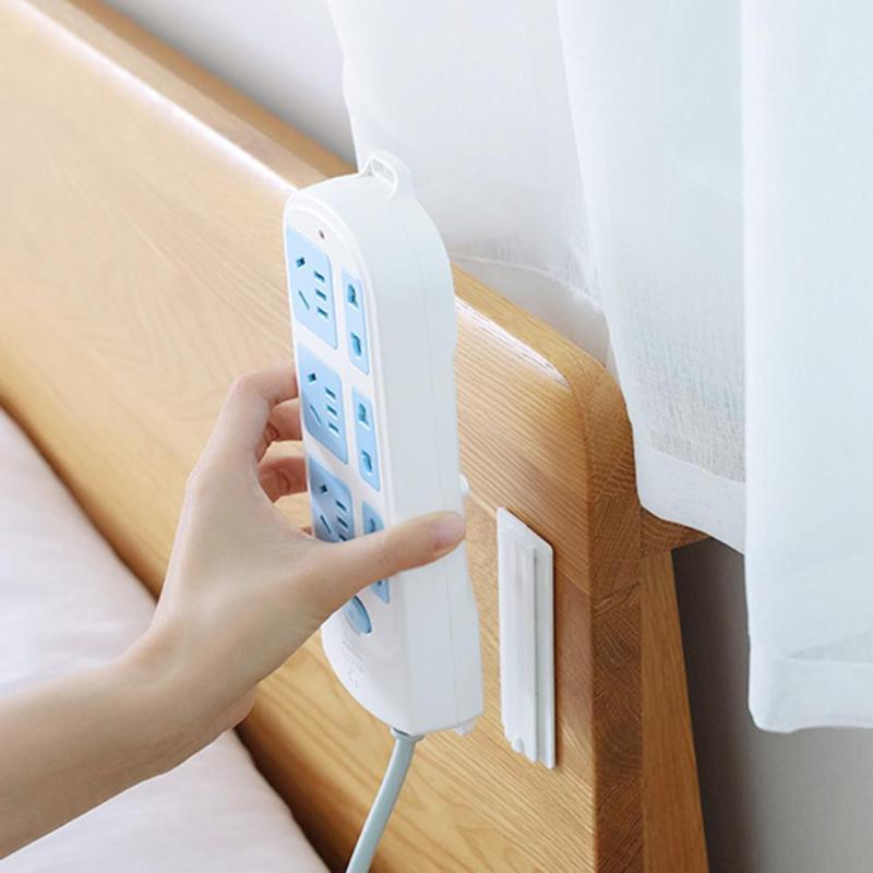 Wall-Mount Power Strip Houder Naadloze Sticker Zelfklevende Home Plug Rack
