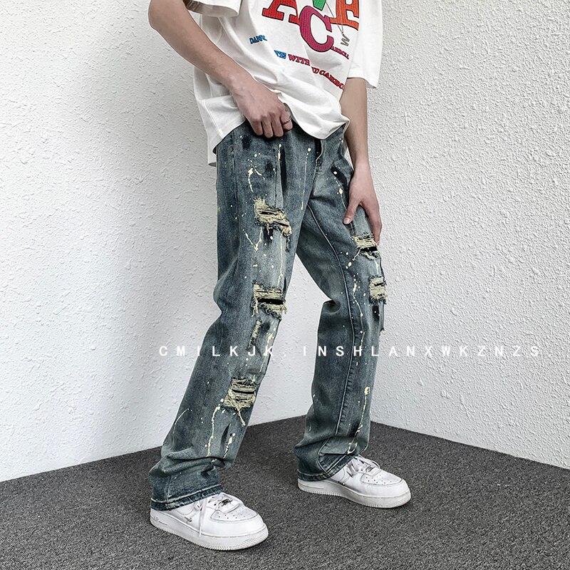 Blu strappato jeans uomo sottile moda casuale gonfio jeans dritti uomo Streetwear anca salto buco denim pantaloni uomo pantaloni M-2XL