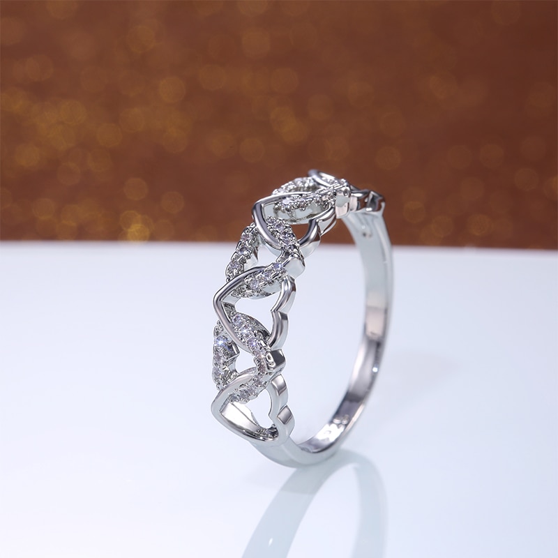 Huitan dobbelt række kors hjerter delikat kvindelig ring cz sten hjerte romantisk bryllup kvinder ringe smykker forlovelsesfest