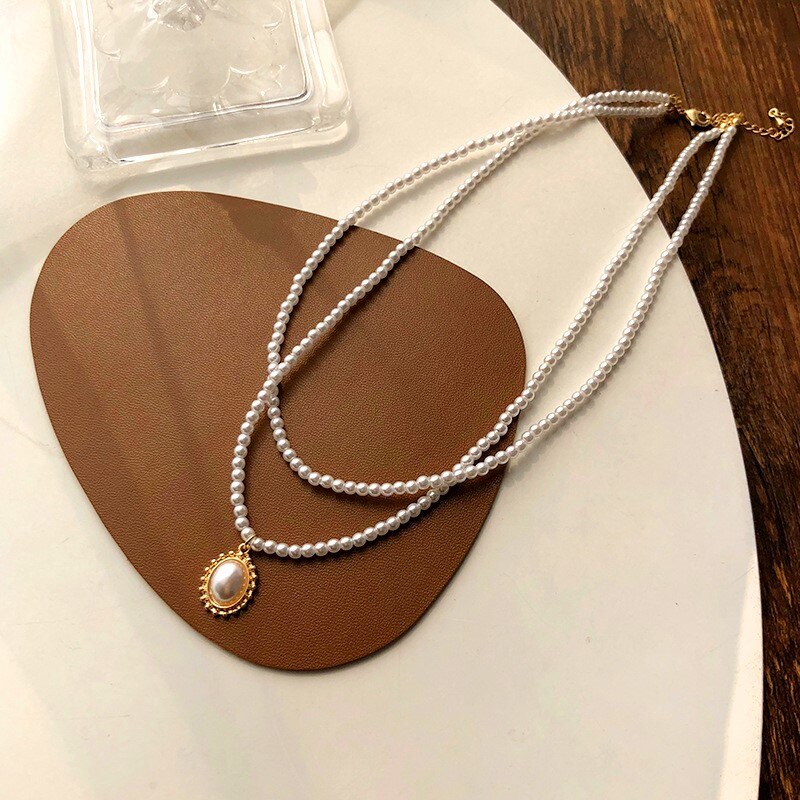 Collana girocollo di perle imitazione per donna perline estive doppio strato moda collo gioielli regalo per amico gioielli con ciondolo di perle