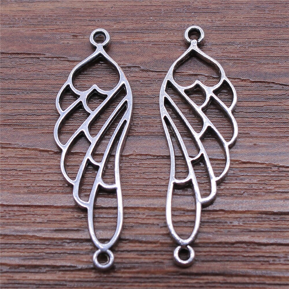 WYSIWYG 15 pièces 10x32mm creux papillon ange ailes connecteur breloques bricolage fabrication de bijoux trouver couleur argent Antique