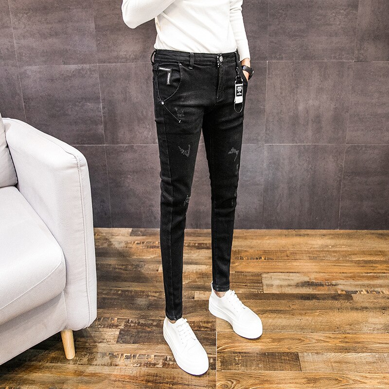 Preto casual selvagem calças de brim masculinas 2020 primavera outono moda rasgado buraco rua magro coreano na moda fino pés magros