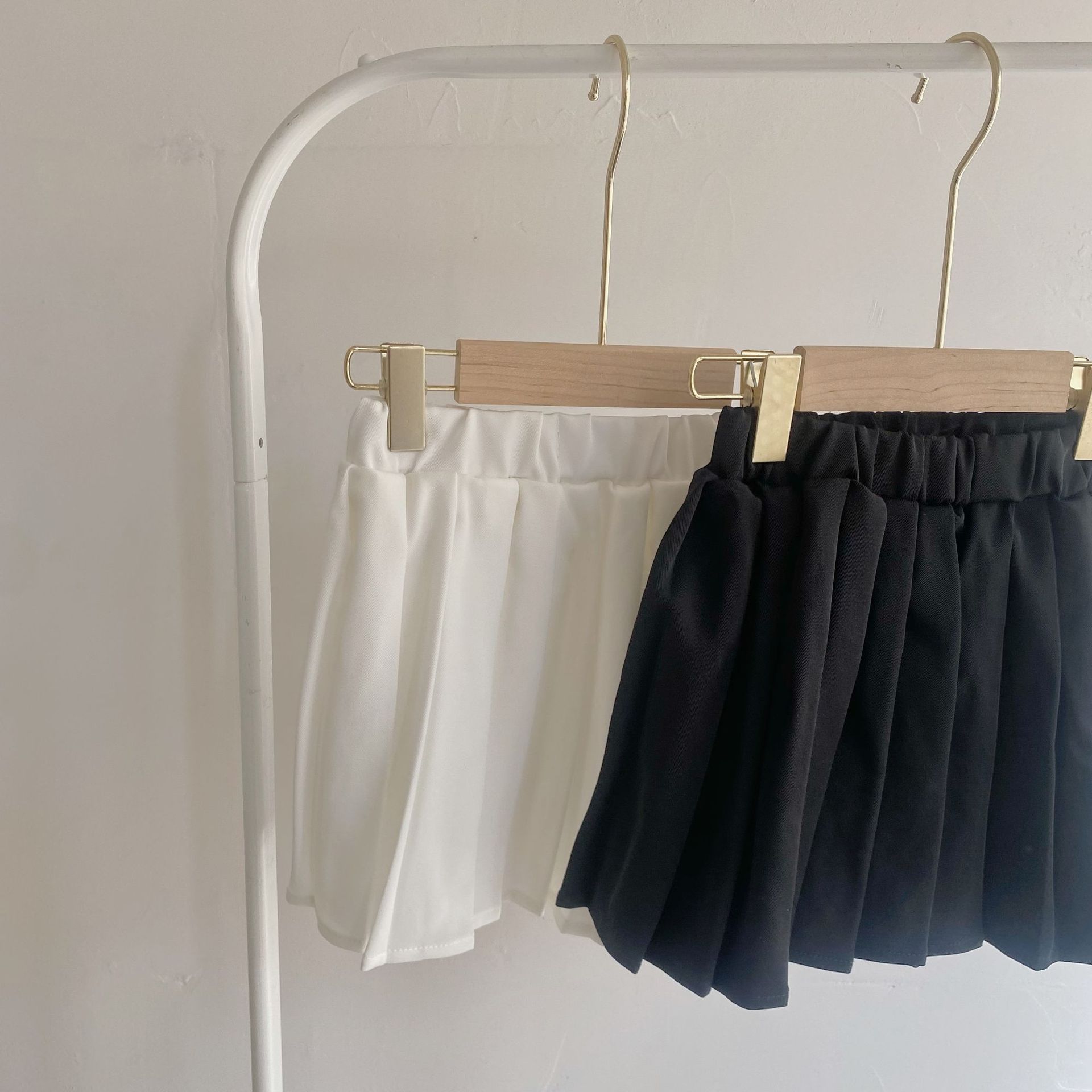 Gonna a pieghe dolce Jk per abbigliamento per bambini gonne in cotone tinta unita stile College Campus per bambini