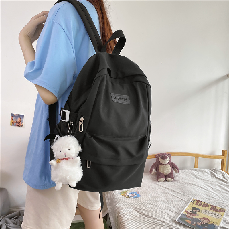 Wasserdichter nylon-rucksack für damen mit mehreren fächern, ideal als schülerrucksack, reisetasche, büchertasche oder schulrucksack für teenager, mädchen und jungen.