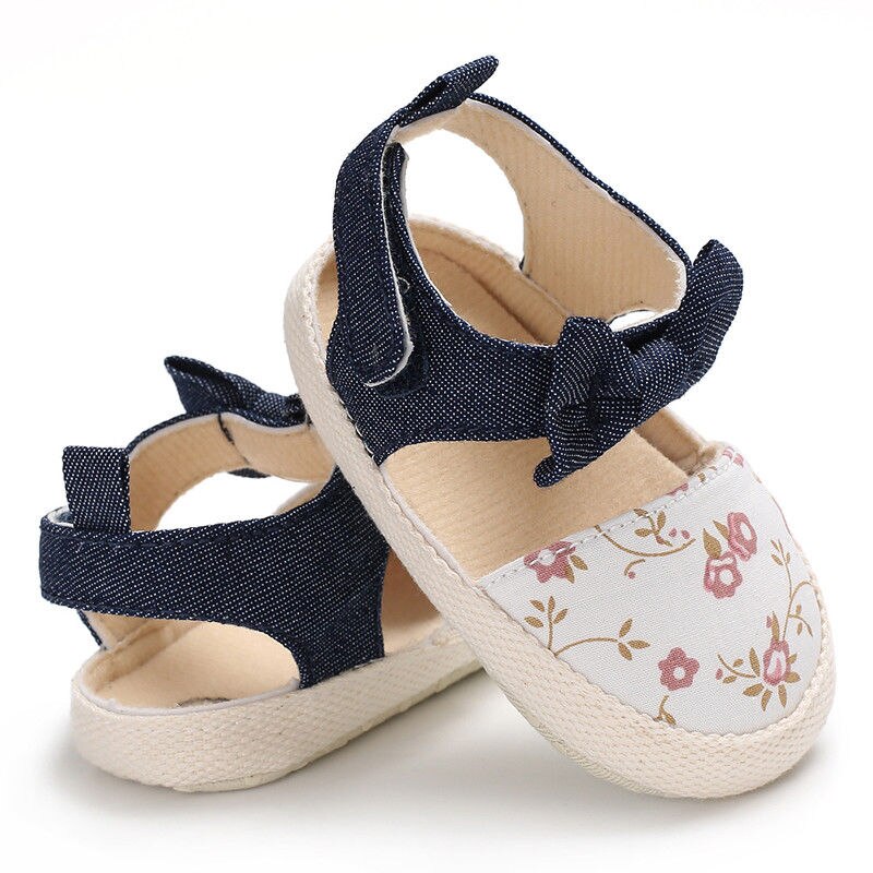 Nyeste merke nyfødt baby jente myke sko myke såler sklisikker bowknot floral baby krybbe sko 0-18m