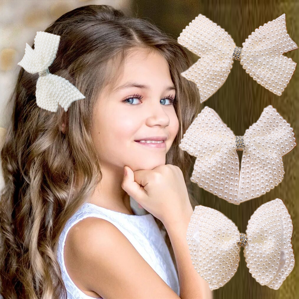 Nuevos lazos para el cabello de perlas blancas con pinzas para el cabello para niñas y niños, capas de Boutique, lazos centrales de diamantes de imitación ostentosos, horquillas, accesorios para el cabello