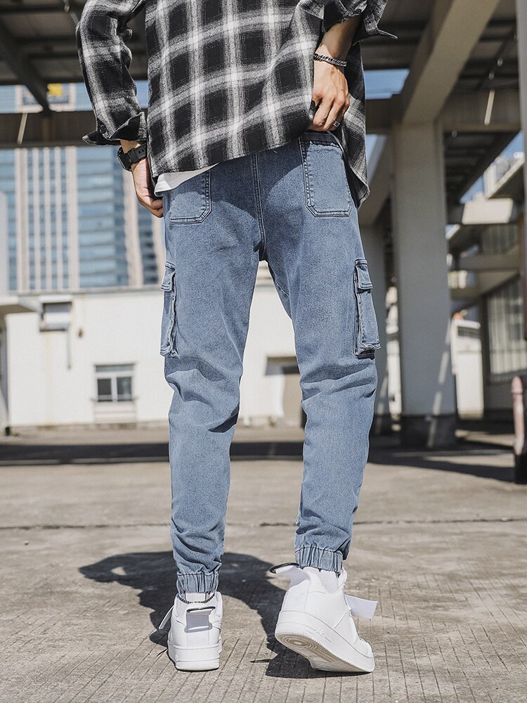 Vårhöst herrjeans med flera fickor, arbetskläder, cargobyxor, svarta blå, resår i midjan, joggingbyxor i stora storlekar, jeansbyxor 8xl