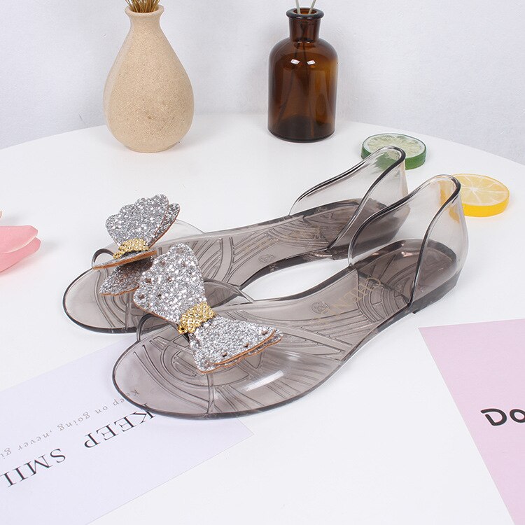 Sandalias de mujer zapatos con los dedos de los pies al aire libre Bling Bow claro transparente playa cómodas sandalias para mujer suave PVC pantuflas de plástico: Silver / 35