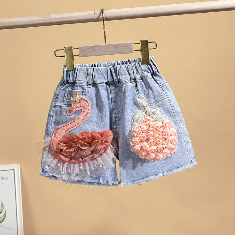 Pantaloncini estivi per ragazze cotone bambino cartone animato cigno Jeans pantaloncini moda adolescente Denim pantaloni corti abbigliamento per bambini 4 8 12 16 anni