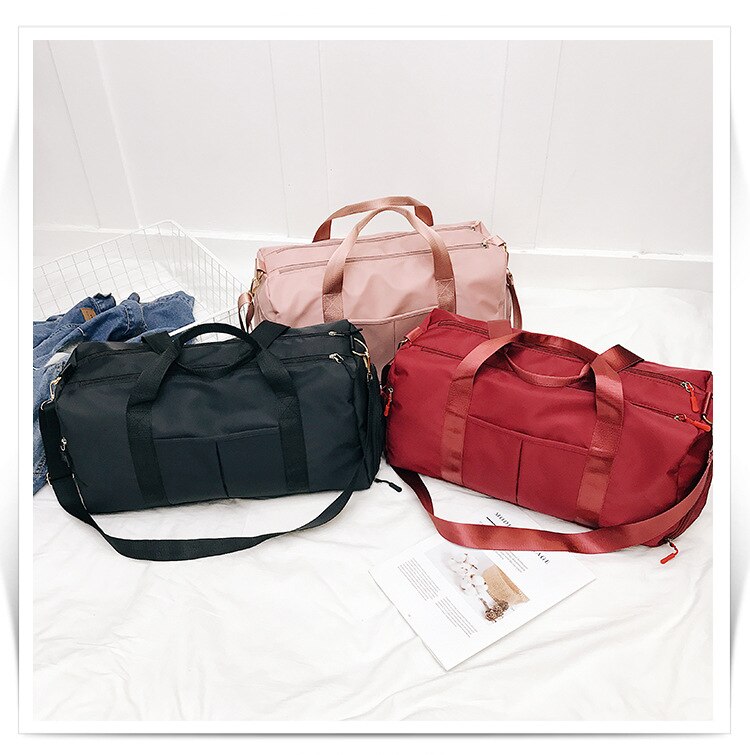 Nylon dames heren reis sport gym schoudertas grote waterdichte nylon handtassen zwart 4 kleuren outdoor sporttassen