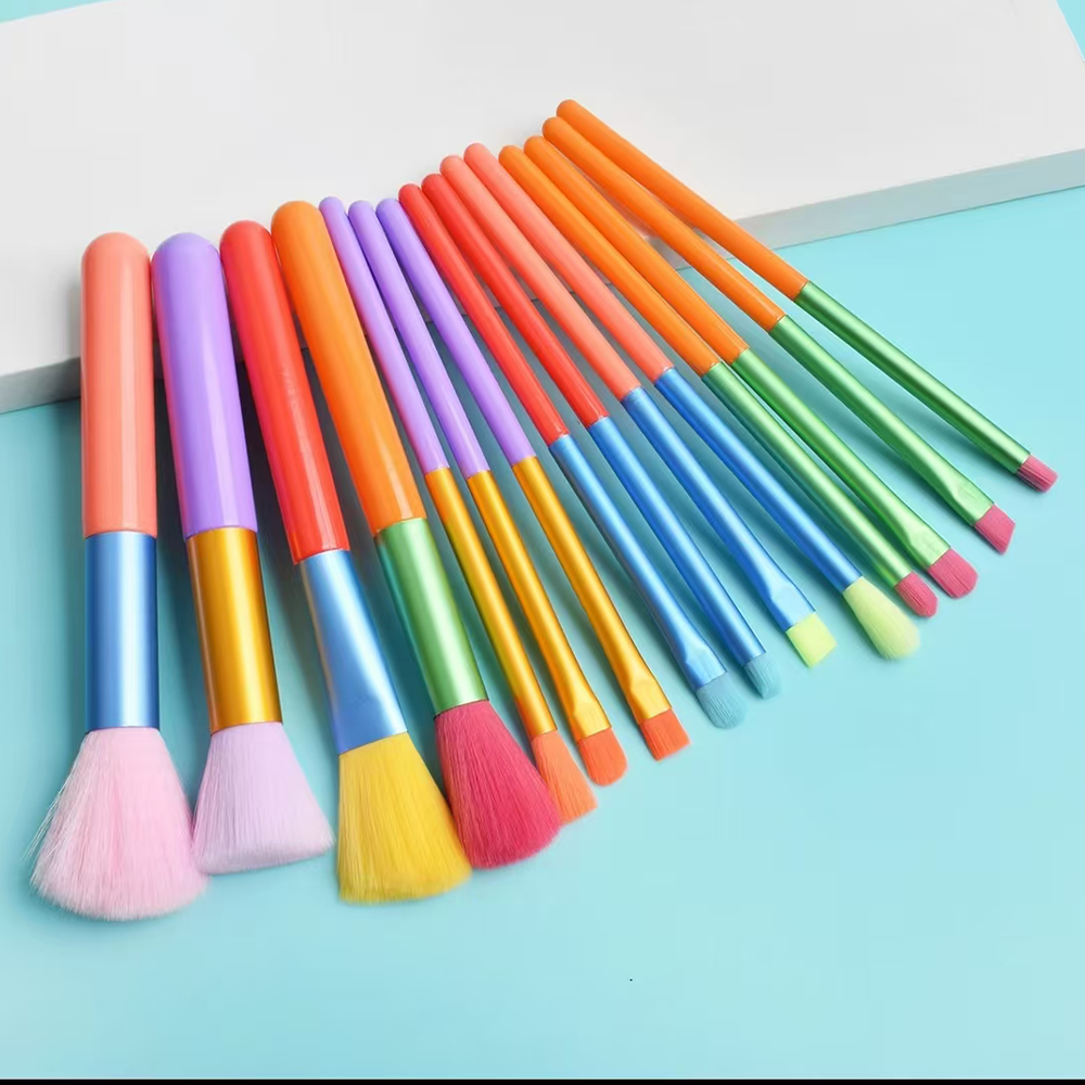 A set of 15 rainbow makeup brushes suitable for beginners - wand style , alcohol free polyester bristles,