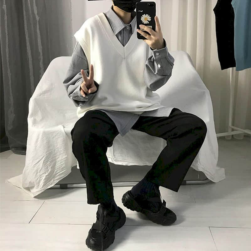 Suéter de punto para hombre, chaleco de Otoño de color sólido, tendencia de estilo coreano, holgado, con cuello en V, sin mangas, estilo universitario