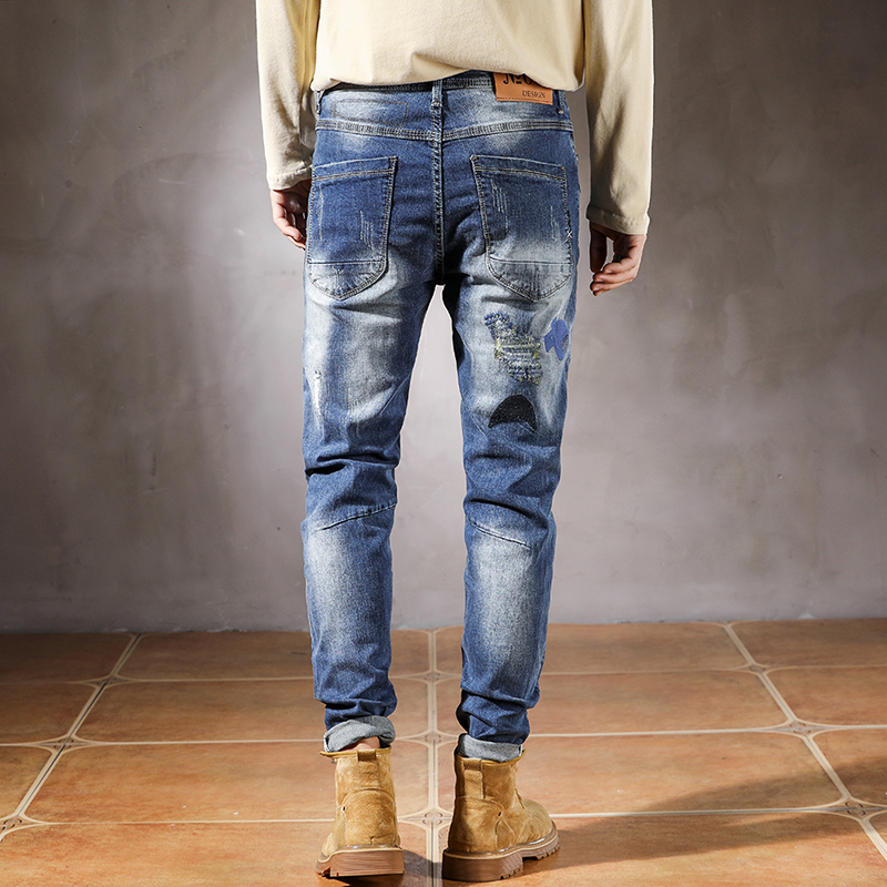 Moto i jeansy dla motocyklistów mężczyźni szczupły dopasowanie rozciągać niebieski biodro chmiel niejednolita całość sztucznie postarzane spodnie dżinsowe z dziurami dla mężczyzn wytarte dżinsy spodnie streetwear