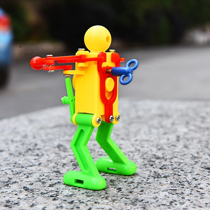Classic Wind Up Toys Children Kids Plastic Clockwork Spring Wind-Up Dancing Robot Toy Random color