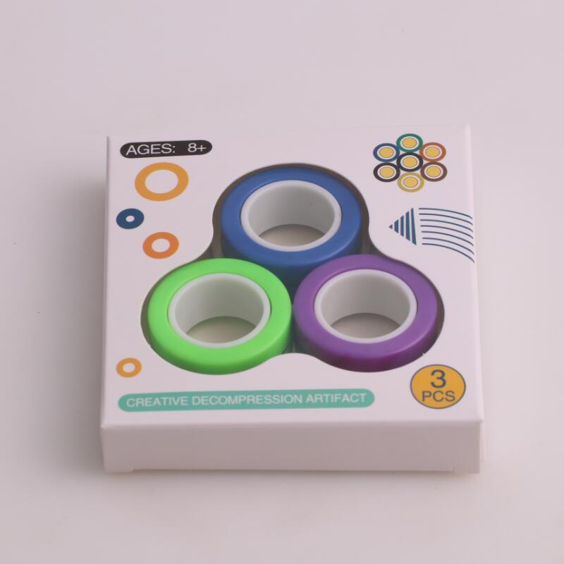 Anti-stress magnetiska magiska ringar packa upp leksaker för magiker trick rekvisita dekomprimering magiska trick små ornament: Blågrön lila