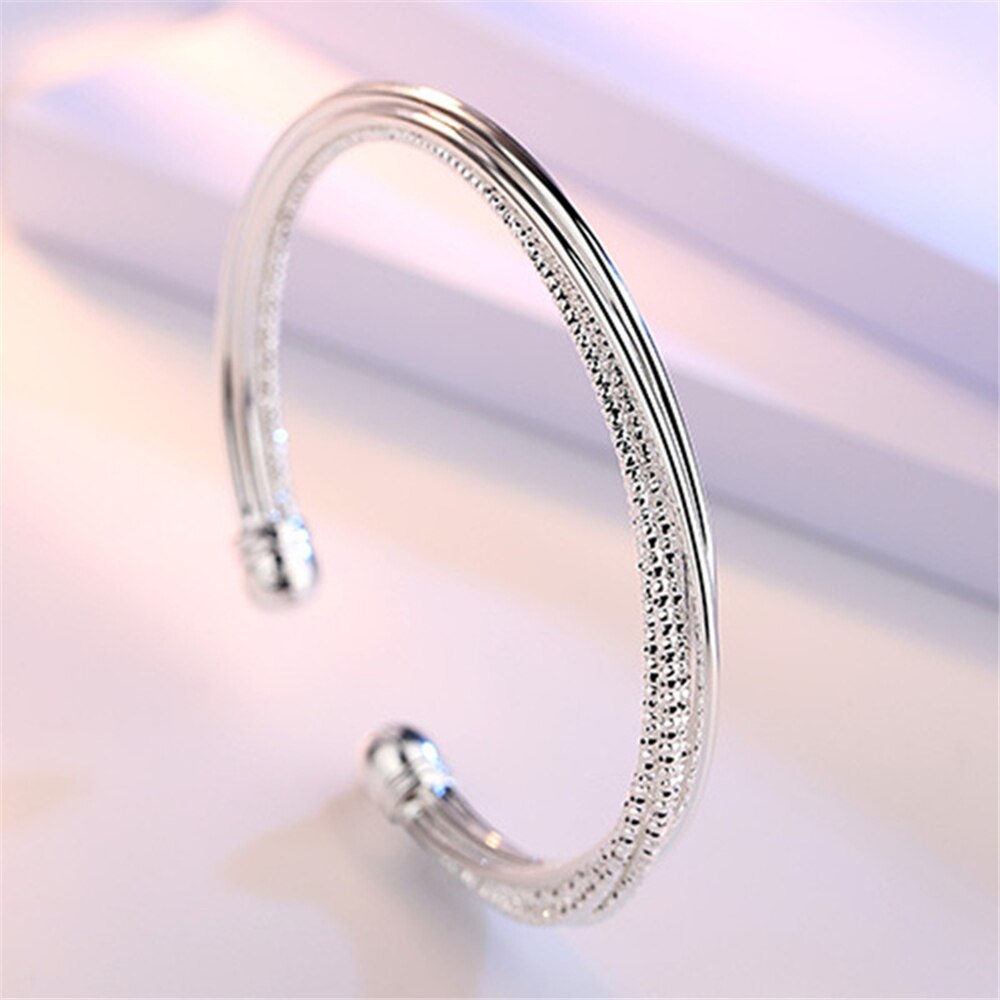 S999 – modèle de bracelet pour femme, couleur argent, ligne torsadée, bouche ouverte, simple, ligne florale de voiture, bijoux