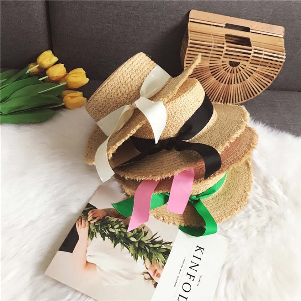 Kvinnor sommar strand raffia solhatt med band rosett raffiahatt temperament platta stråhattar dam båtägare solhatt raffia solhatt