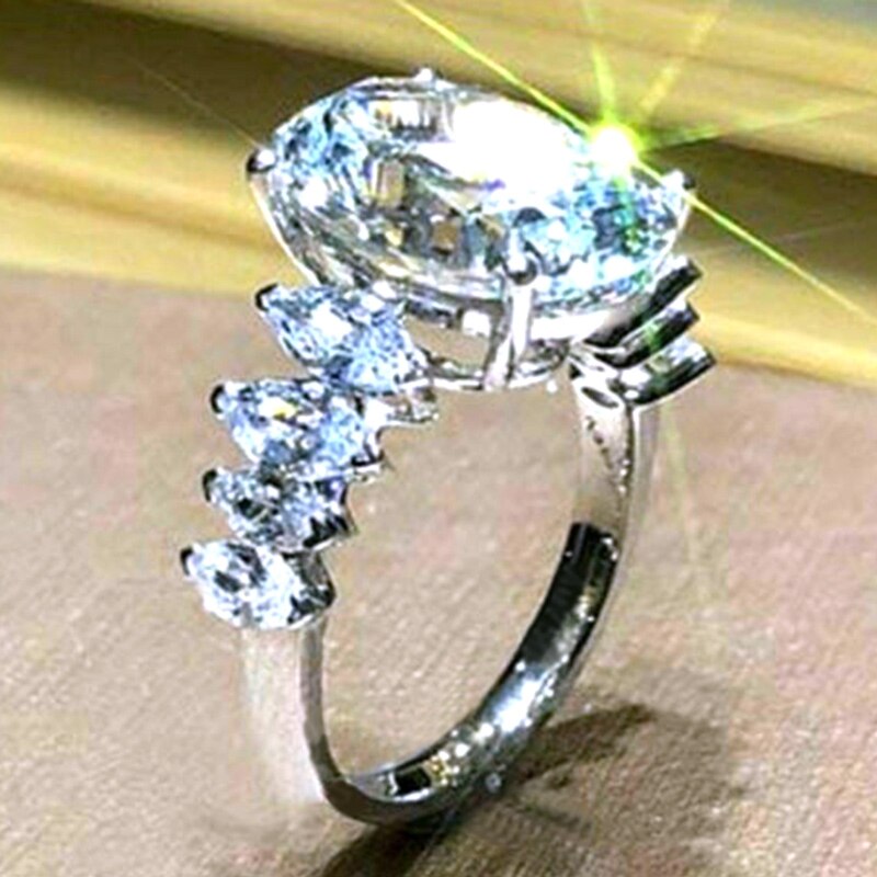 Huitan magnifiques femmes bandes de mariage anneau grande pierre de Zircon ovale autour de 8 pierres Marquise bague de mariée bijoux de: 8