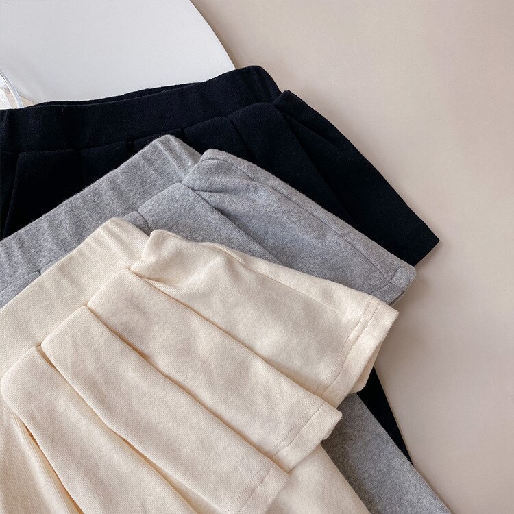 Automne mignon filles couleur unie plissé jupe-culotte bébé fille coton tout-match jupe avec leggings
