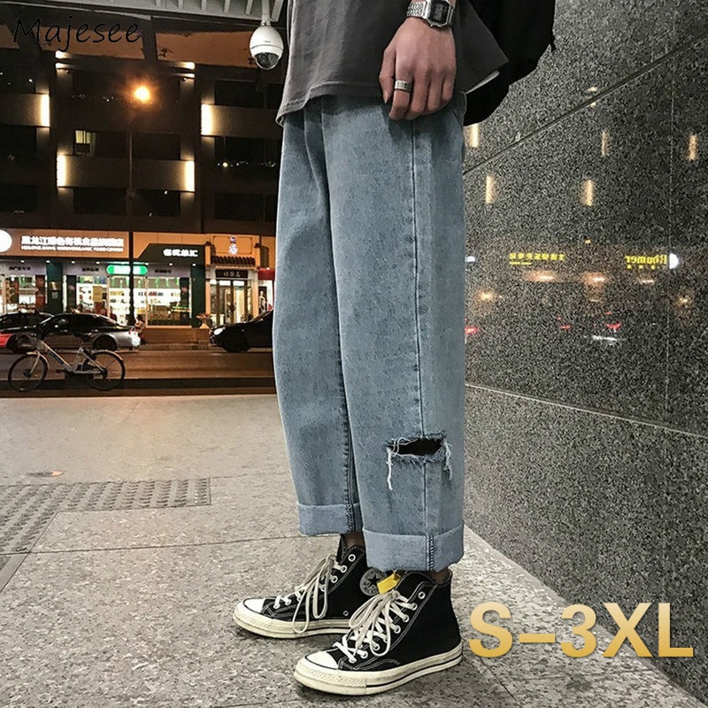Męskie jeansy dzikie nogawki do kostek cienkie proste workowate spodnie rekreacyjne z dziurami spodnie jeansowe męskie wszystkie mecze stylowe Streetwear