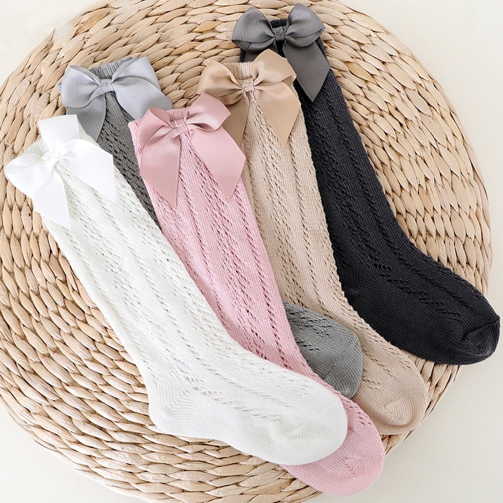 Peúgas infantis com arco crianças verão meninas joelho longo meias altas algodão macio oco para fora crianças malha princesa meias para 0-2 anos