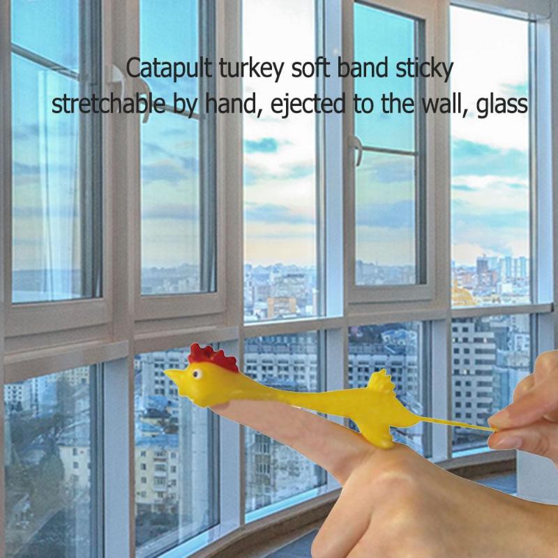 11.5cm Novelty hand catapulted walls glass Joke Finger Toys Stretchy Flying Laugh Turkey Sticky scream Chicken toys non-toxic