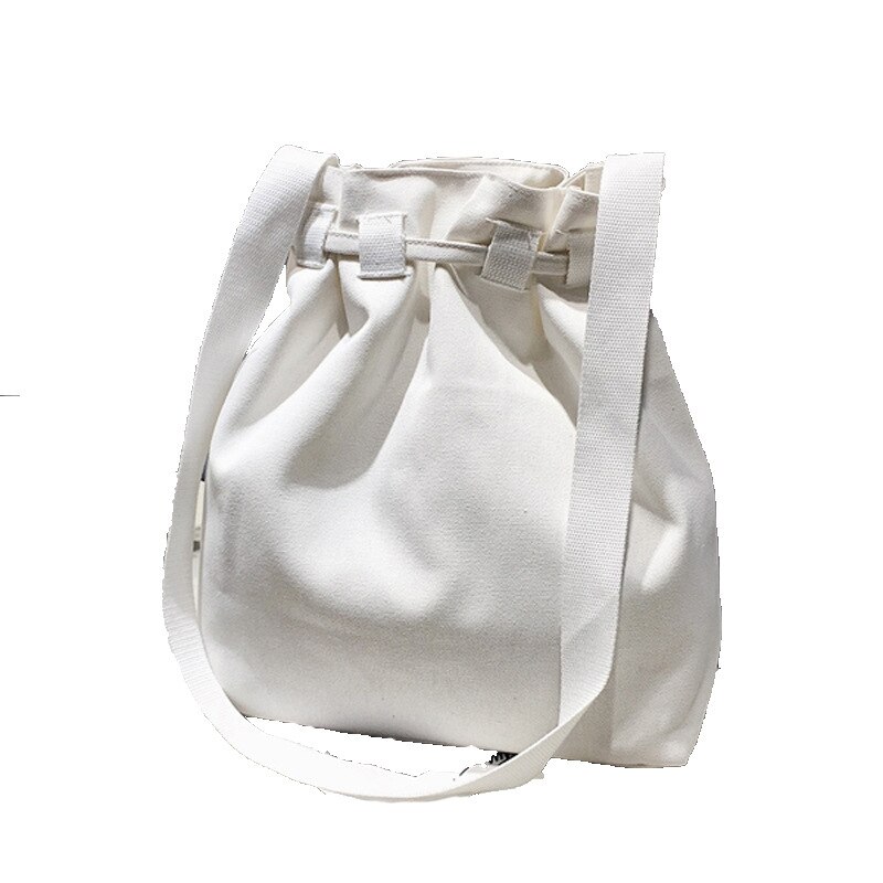 Nian lente en zomer koreaanse versie van de eenvoudige emmer canvas tas schouder laptop bulk tas messenger vrouw