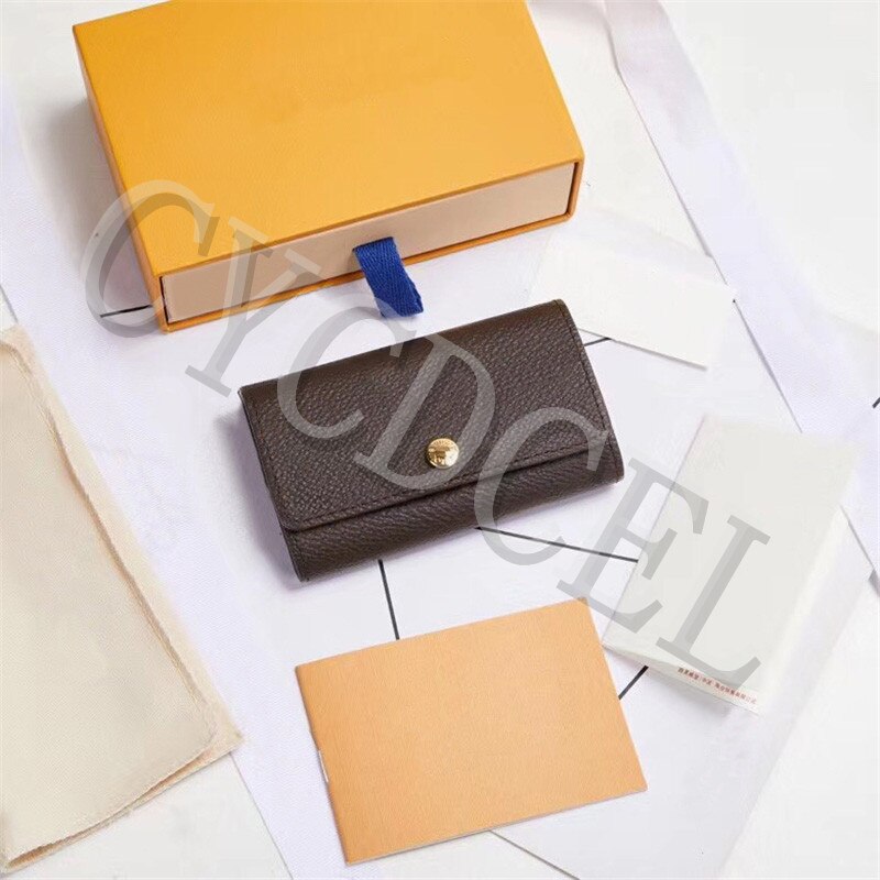 Klassisk luksus mand / kvindes mini-nøgletaske bærbar seks nøgle kobling bedst leveres med støvpose og kasse