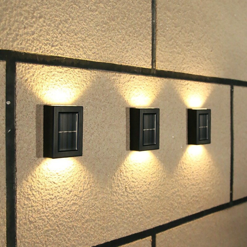 4pc solar led vegglampe utendørs vanntett vegglampe lys opp og ned hage husholdning dekorativ belysning lampe: Svart varmt lys