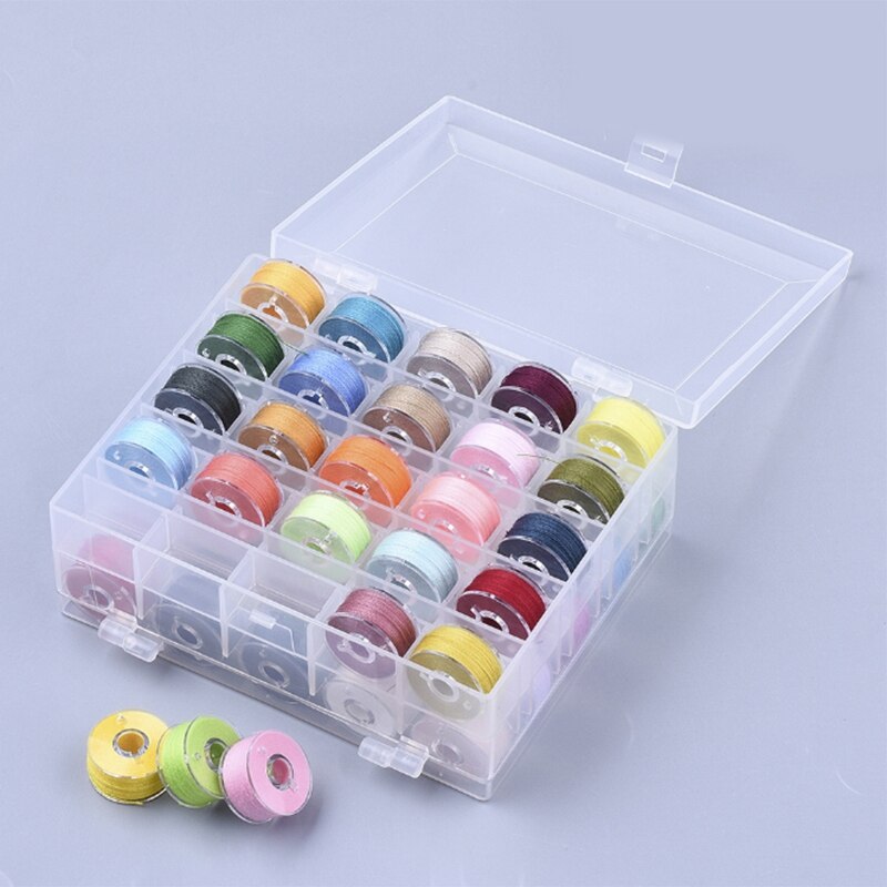 50 klossen en naaigaren met doosje handgemaakte naaigaren