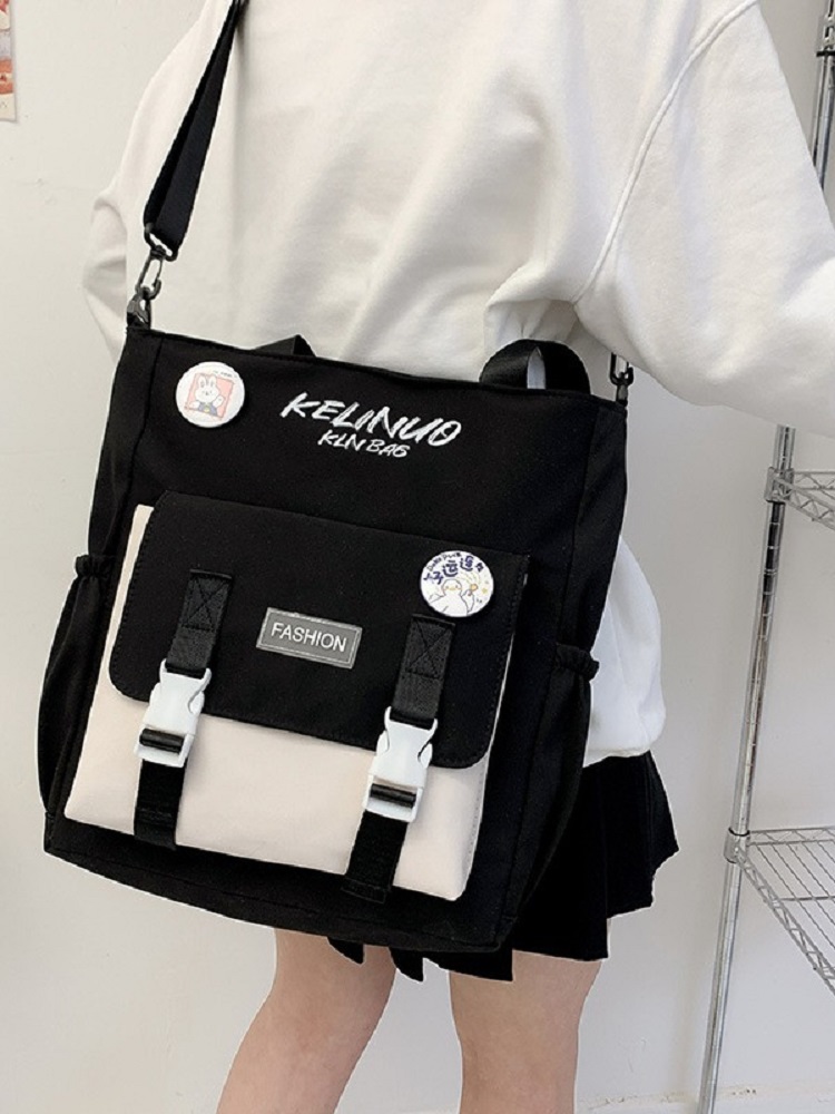 Søt jenteskulderveske skoleveske kvinnelig ins universitetsstudent lerretsveske crossbody stor kapasitet bokveske messengerveske
