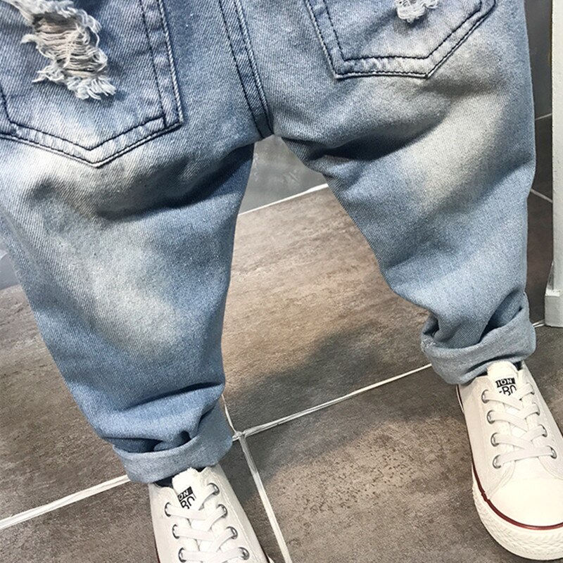DFXD Jeans per ragazzi autunno moda cotone elastico in vita Jeans strappati pantaloni pantaloni lunghi in Denim con foro rotto pantaloni senza cintura 2-7 anni