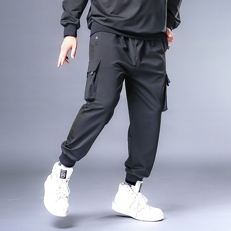 Pussihousut miehet hip hop katumuotit rahtihousut iso koko 7xl collegehousut miesten lenkkeilijä oversize housut musta  hx531