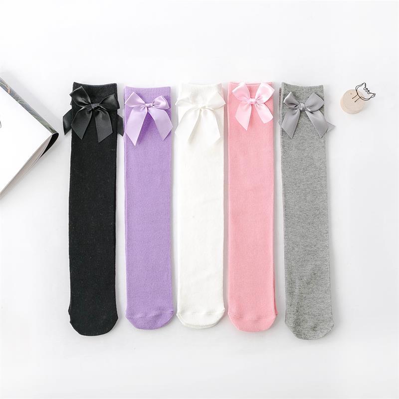 Medias hasta la rodilla para niños y niñas, medias rectas sin talón, color puro, con lazo encantador, medias hasta la rodilla