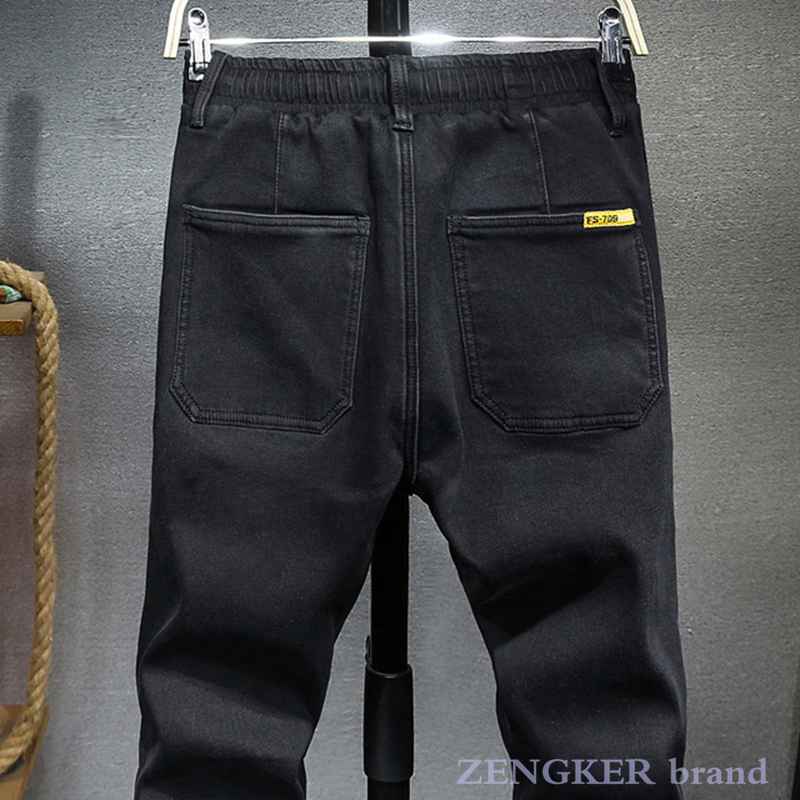Pantalones vaqueros holgados de estilo japonés para hombre, pantalón harén de terciopelo elástico de talla grande, con cordones, color negro, 7XL, 6XL