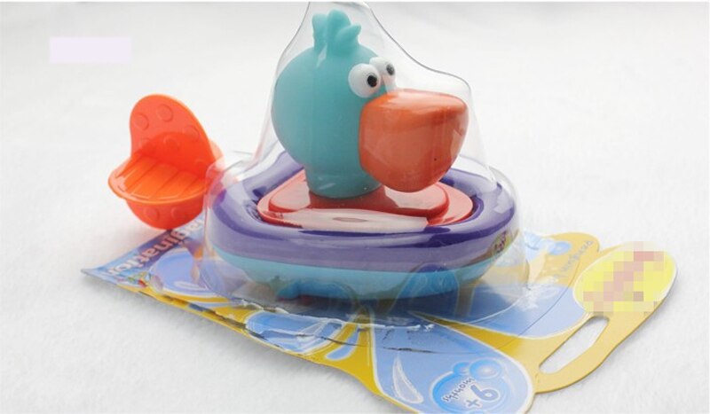 Top Pull line boat bath toy baby backguy Play in water clockwork baby toy swim water toys children Wound-up Doll