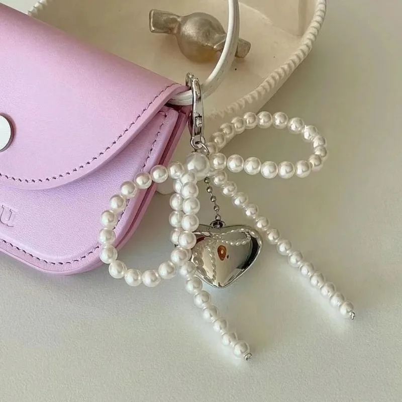 LLavero con forma de corazón y lazo de perlas, mochilas, llavero con forma de corazón con lazo, accesorios colgantes DIY para bolso, teléfonos móviles universales